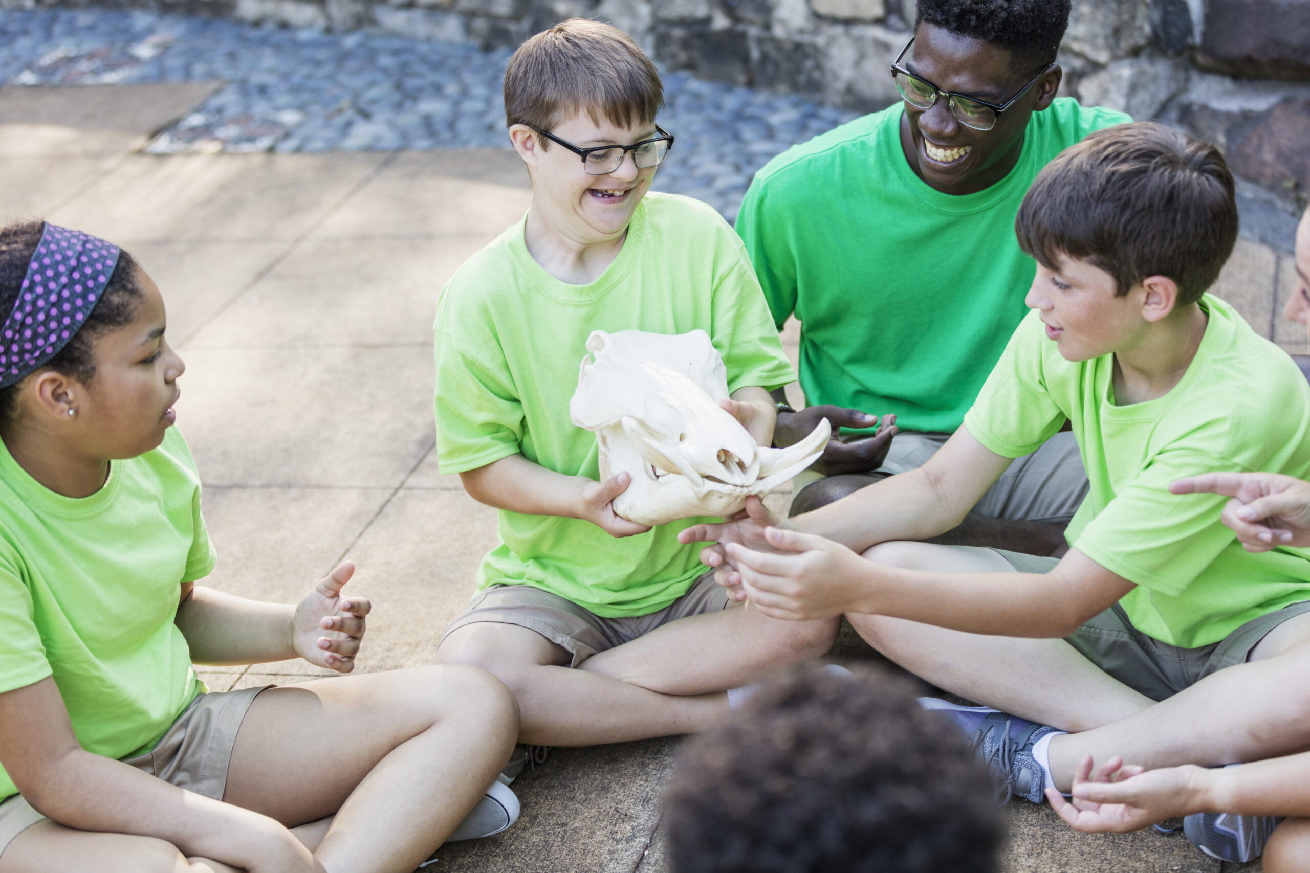 Children on field trip to zoo, boy with down syndrome